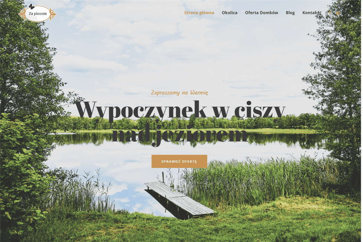 Za Piecem holiday cottage rental website homepage with a lake view hero